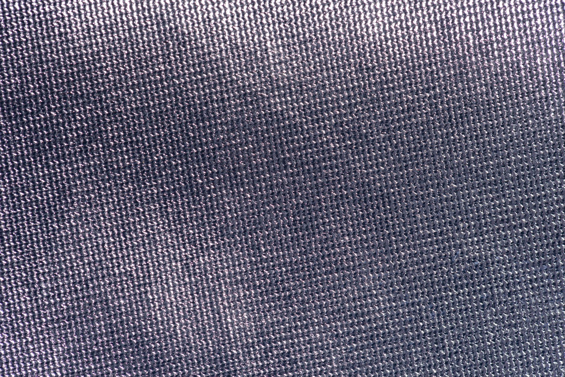 Gros plan sur une texture de tissu gris