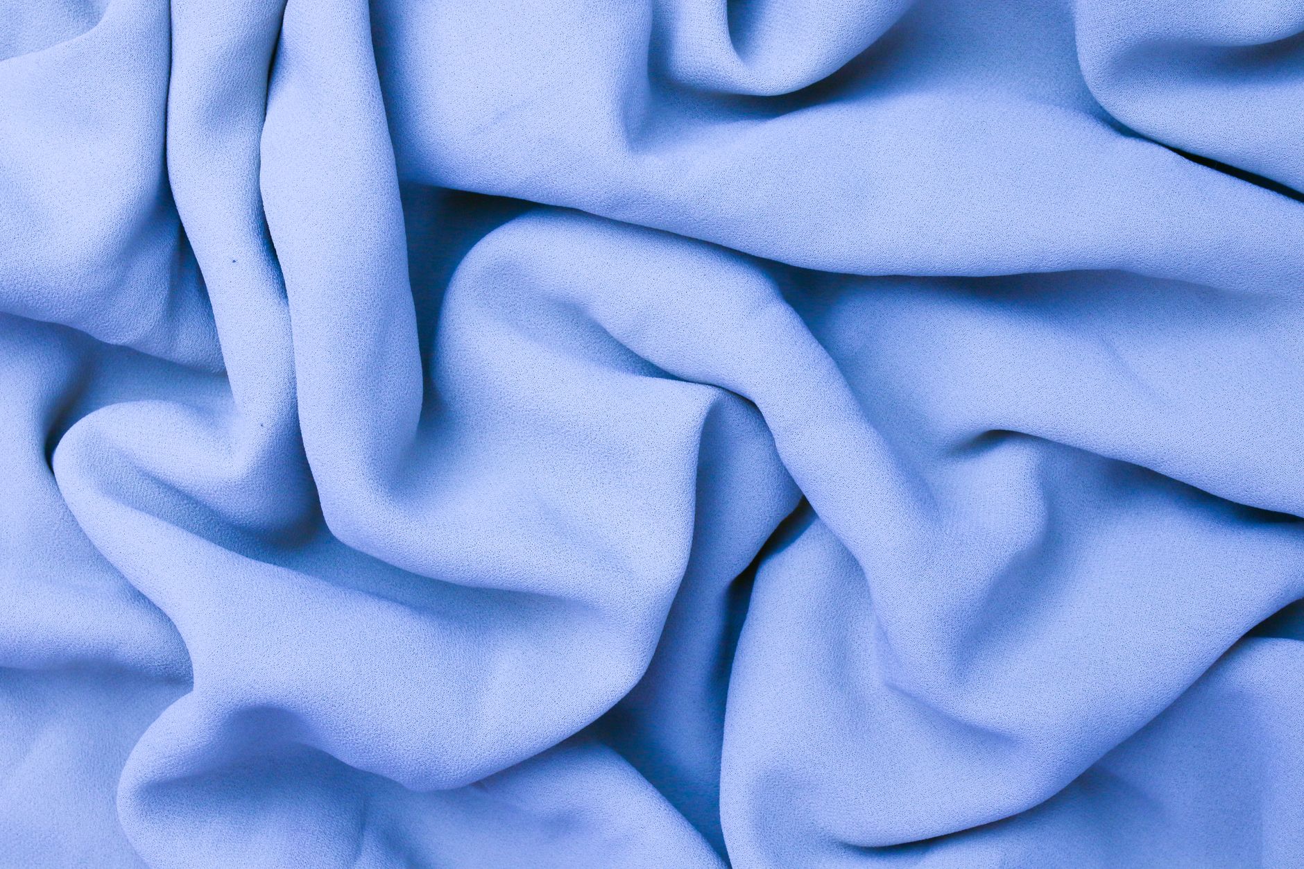 Tissu bleu souple aux plis doux